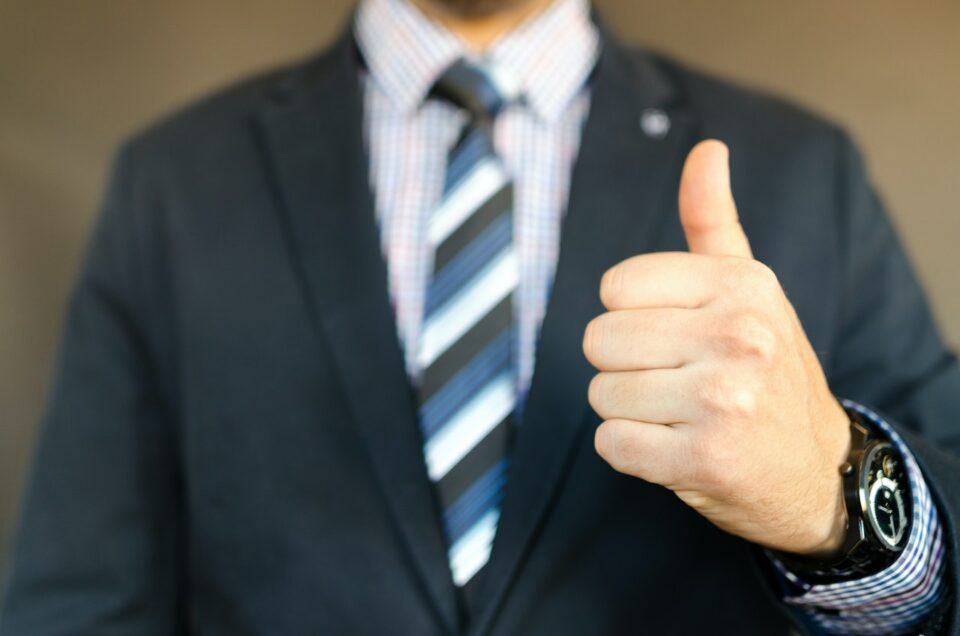guy in suit thumbs up