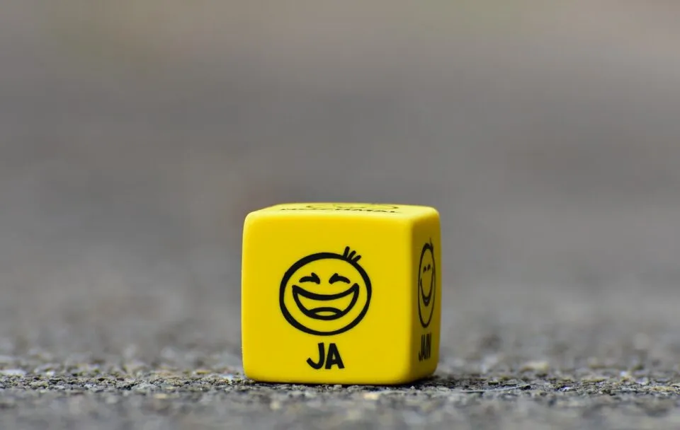 happy yellow dice